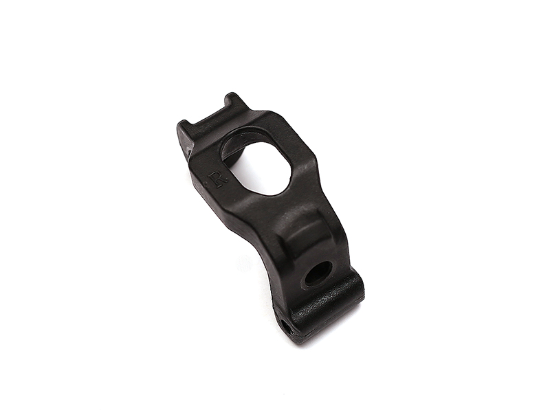 23.ZT65 Yokomo B7-413W Front Right Steering Hub Carrier (used) - Image 1